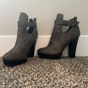 boots 1 small scratch on the heel I bought them like that never worn